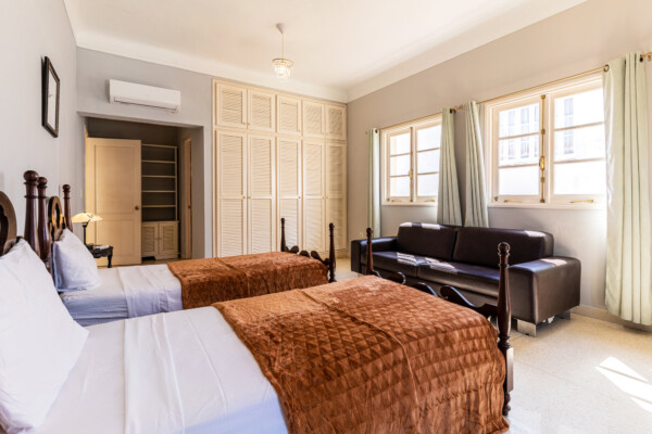 Anastasia Suite – Cozy seating area with elegant accents Miramar Residence – Room Anastasia seating area with vintage accents