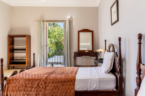 Anastasia Suite – Patio views from large, Old Havana style window Miramar Residence – Room Anastasia patio views from large, Old Havana style window