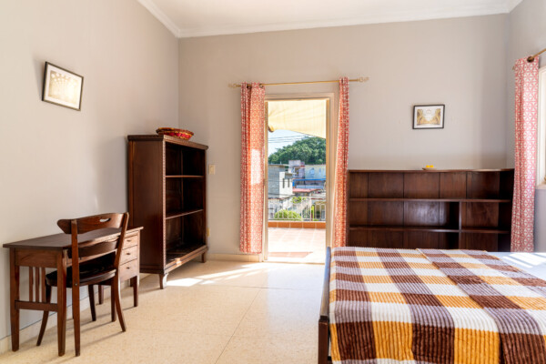 Sacha Suite – Elegant suite with colonial accents Miramar Residence – Room Sacha with colonial-inspired décor