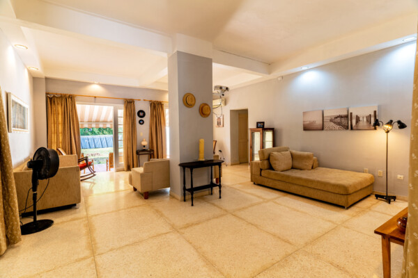 Living Room – Spacious area with vintage décor Miramar Residence – Living Room spacious and vintage décor