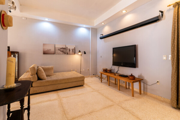 Living Room – Projection screen for entertainment Miramar Residence – Living Room with projection screen