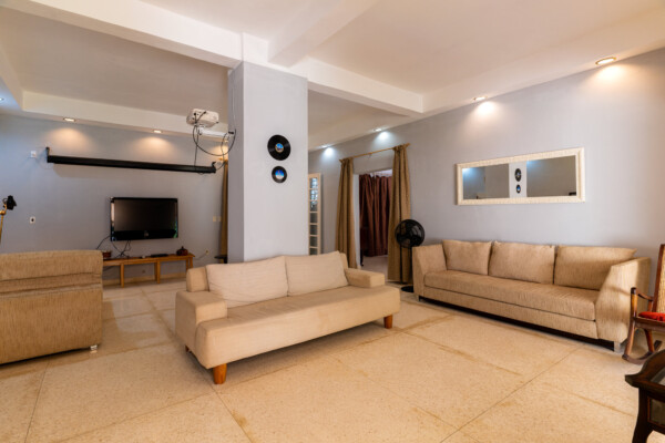 Living Room – Elegant seating and art Miramar Residence – Living Room seating and art