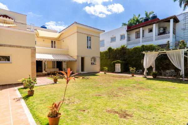 Patio – View towards the main house Miramar Residence – Patio view towards main house