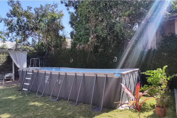 Patio - Large above-ground swimming pool Miramar Residence – Swimming Pool